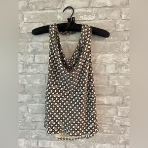 A must have! Great for a night out or wear to work under a blazer.